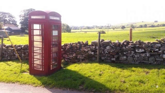 Traditional phonebox used as a book swap on Moor Road